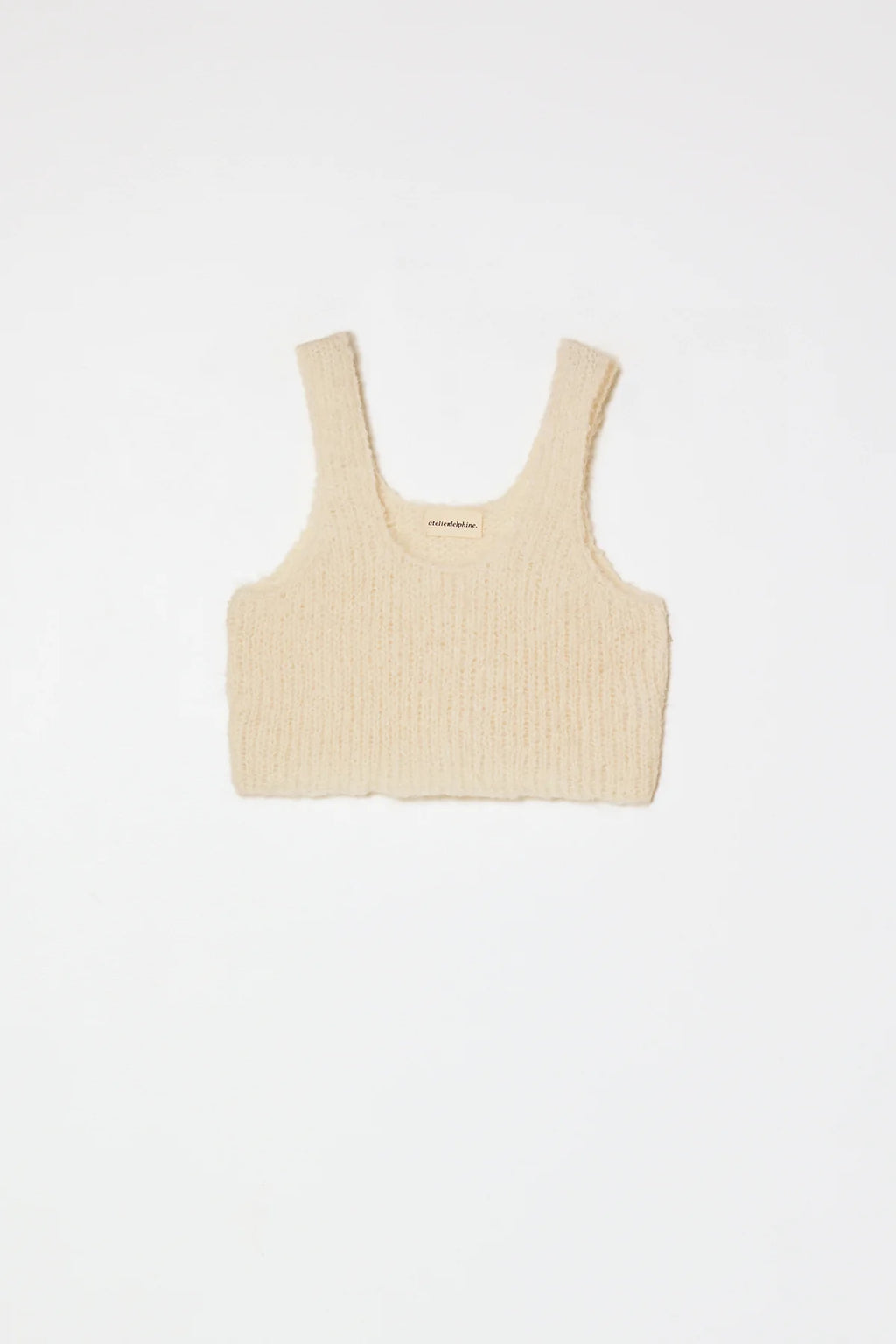 A cream knit tank by Atelier Delphine 