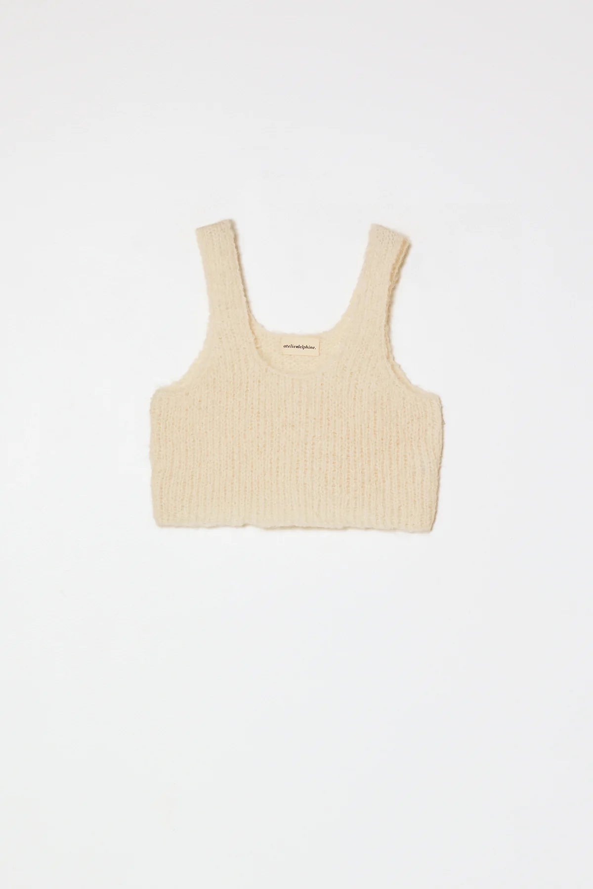 A cream knit tank by Atelier Delphine 
