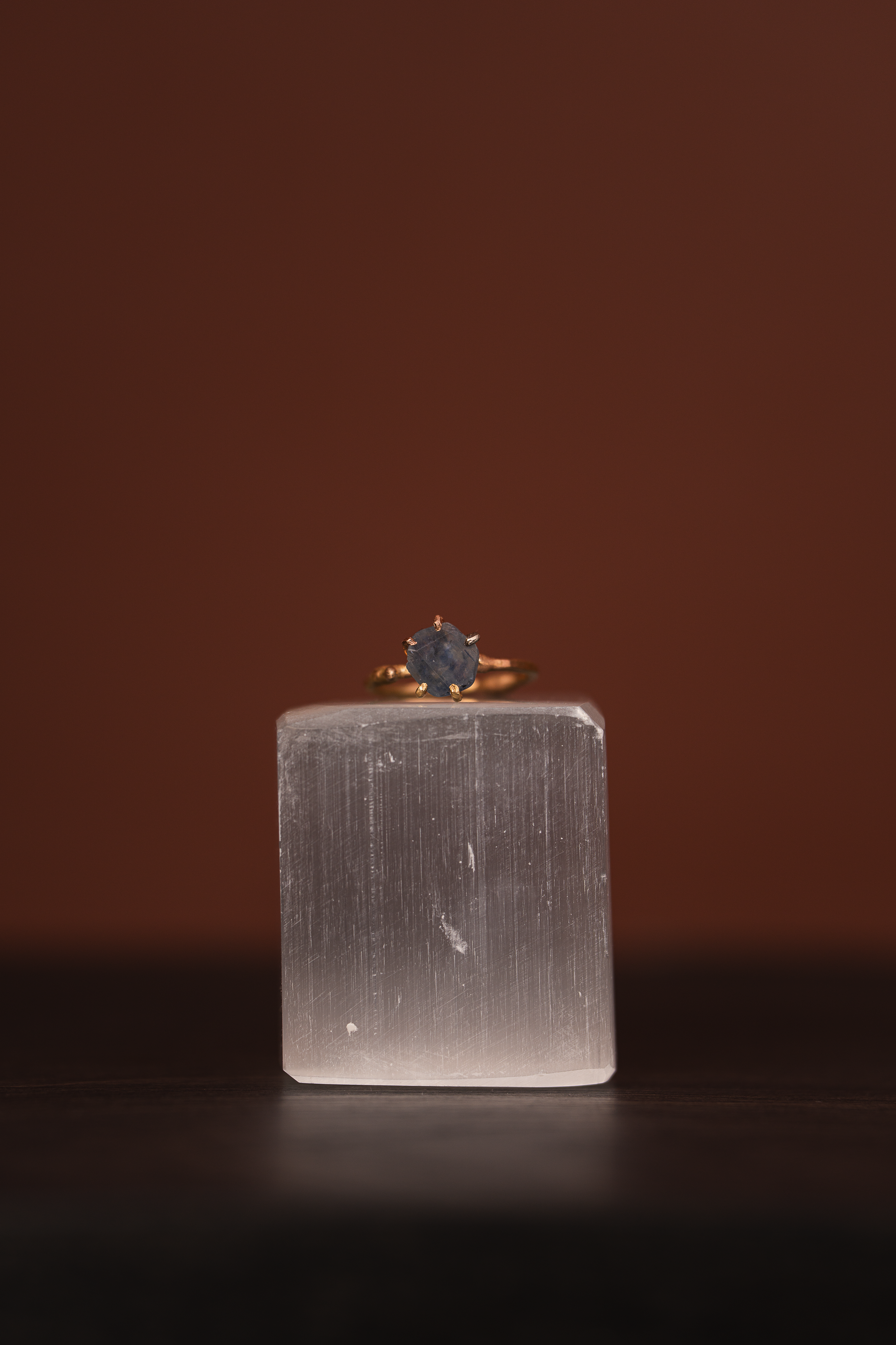 Montana sapphire small stone ring on a yellow gold band