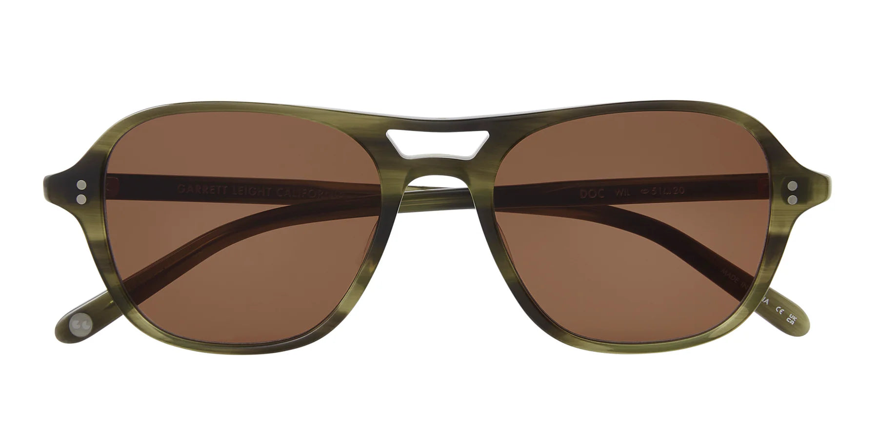 Sunglasses with brown lenses and green frame on a white background