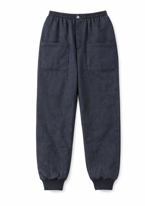Dark navy blue corduroy pants with an elastic waistband, button closure, and two large patch pockets on the back, shown against a plain white background. Survival Linen Quilted Pants by Fashion Brand Company.