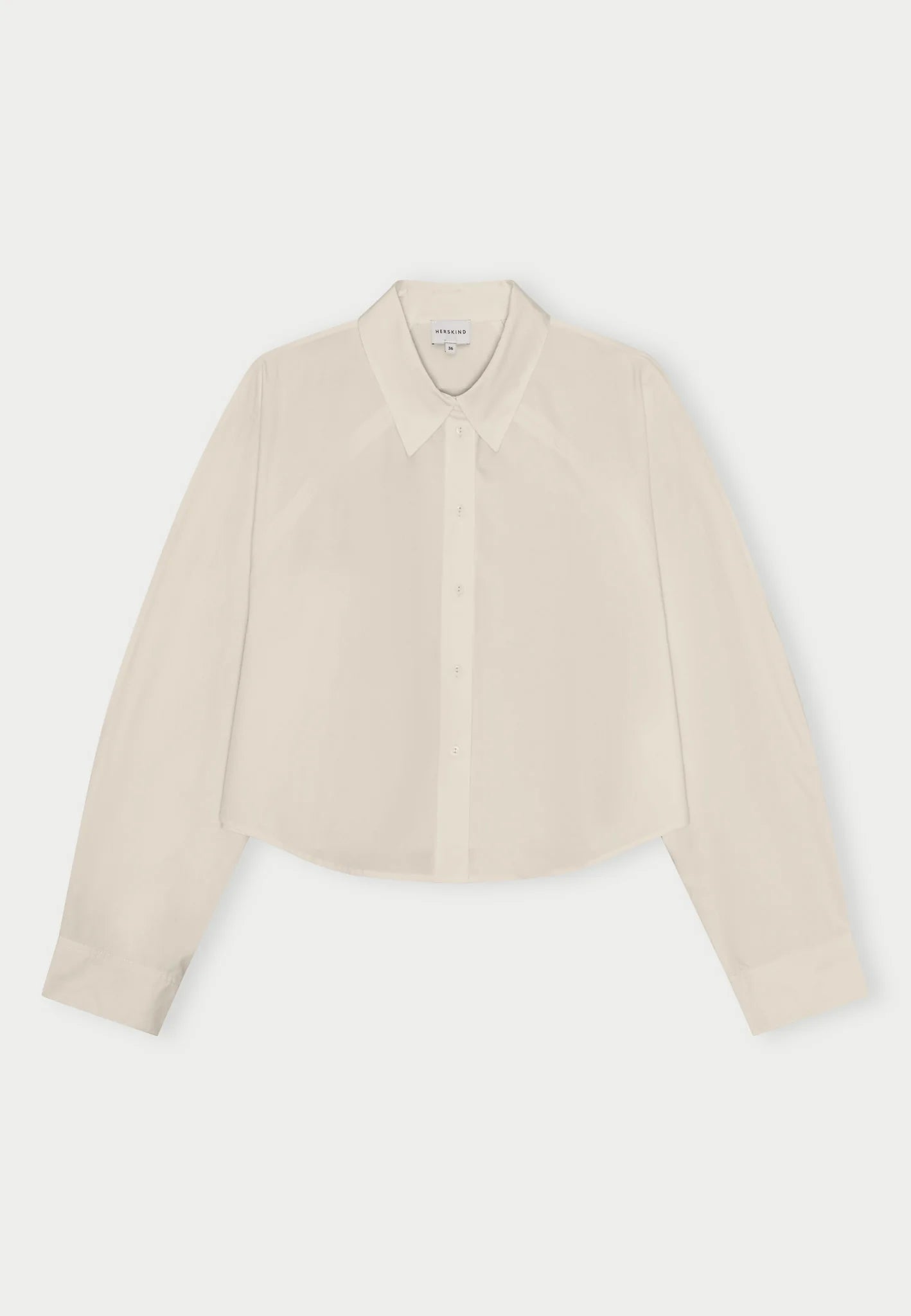 An oyster white Elsie shirt by Herskind against a plain background