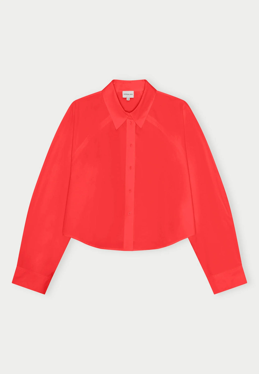 Red Elsie shirt by Herskind against a plain background