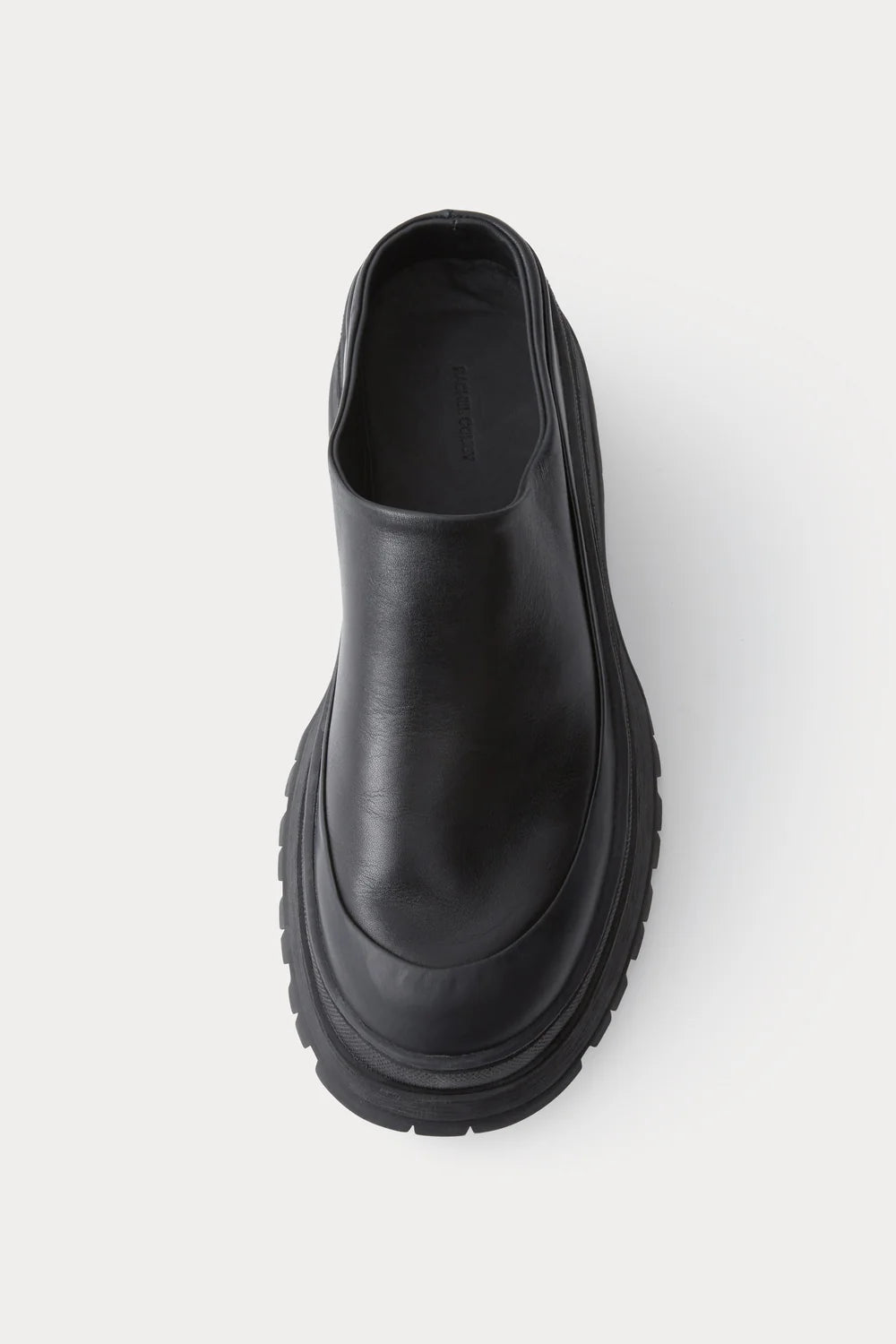 Black leather Slip in Barla Mule by Rachel Comey.