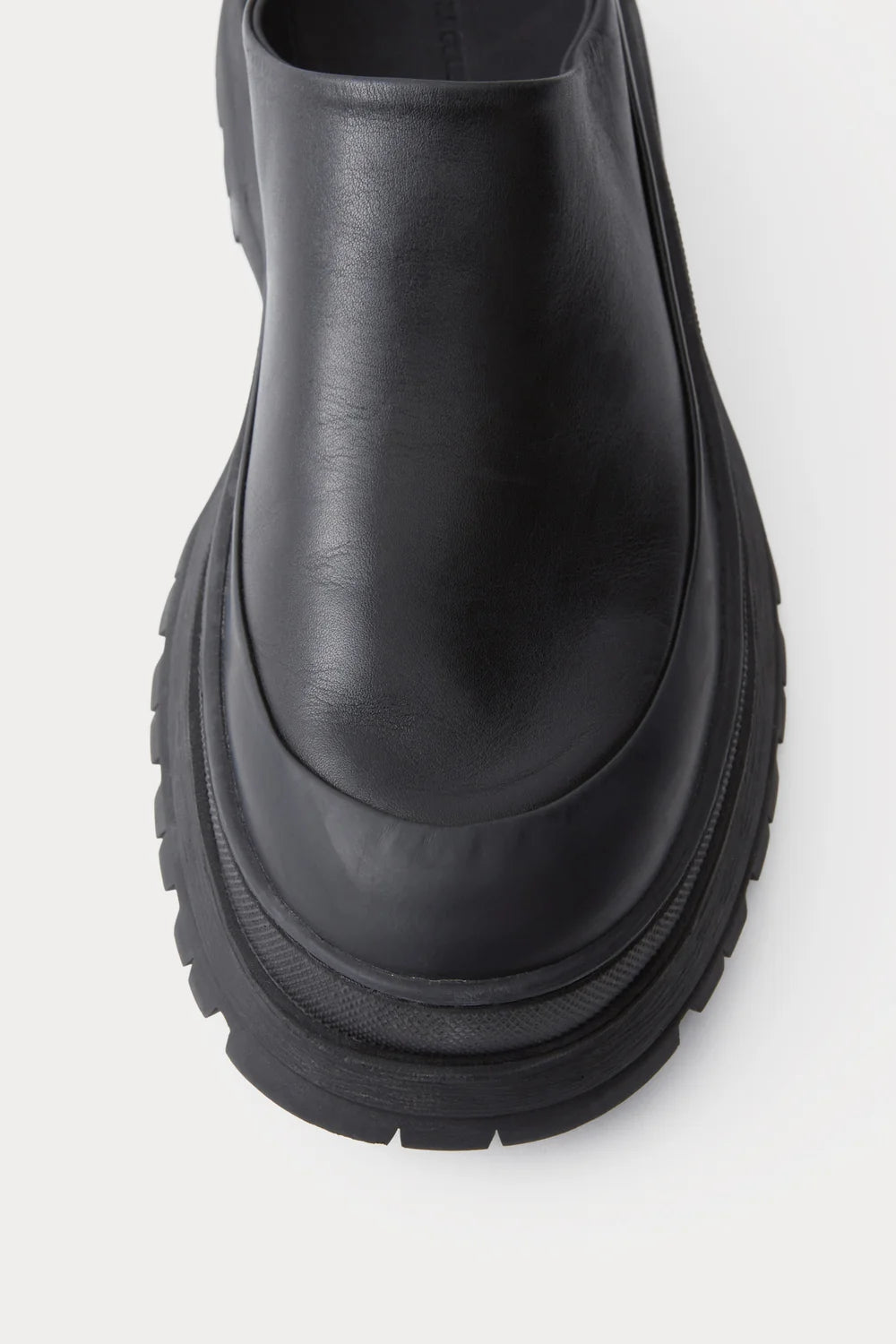 Black leather Slip in Barla Mule by Rachel Comey.