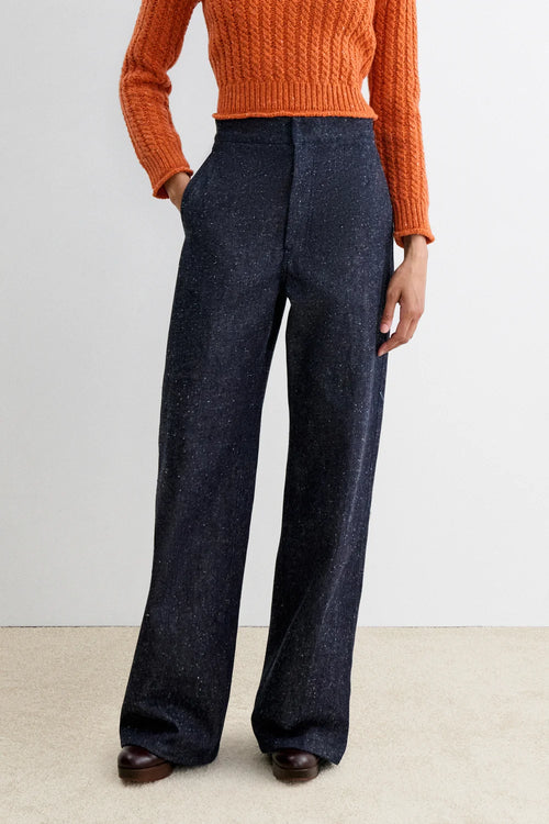 Model wearing Dark wash high waisted denim with specs - Rachel Comey Bruntin Pant