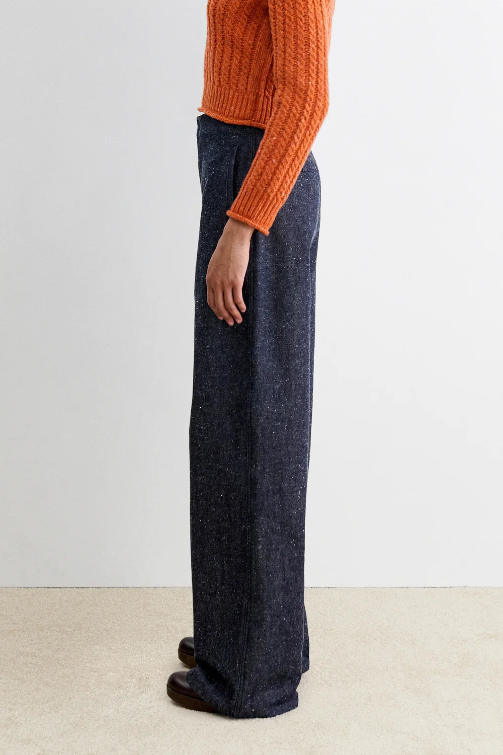 Model wearing Dark wash high waisted denim with specs - Rachel Comey Bruntin Pant