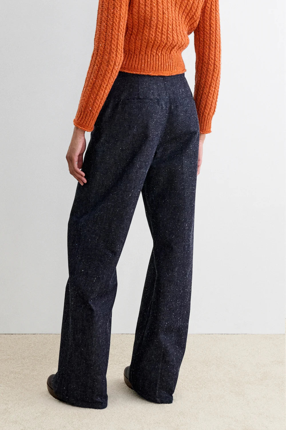 Model wearing Dark wash high waisted denim with specs - Rachel Comey Bruntin Pant