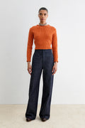 Model wearing Dark wash high waisted denim with specs - Rachel Comey Bruntin Pant