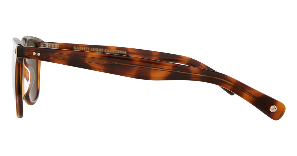 Brown spotted shell sunglasses with smokey lens on a white background.