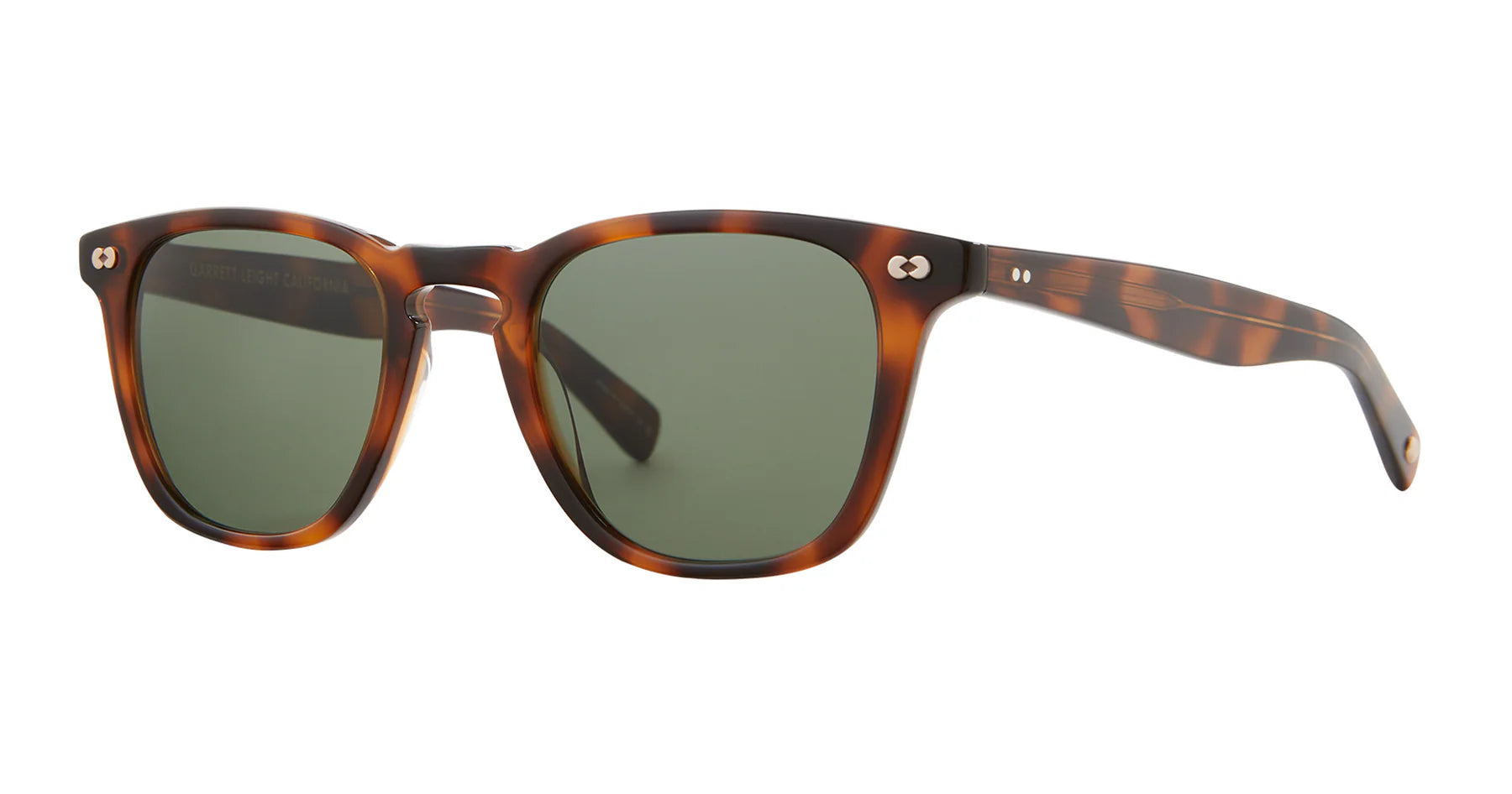 Brown spotted shell sunglasses with smokey lens on a white background.