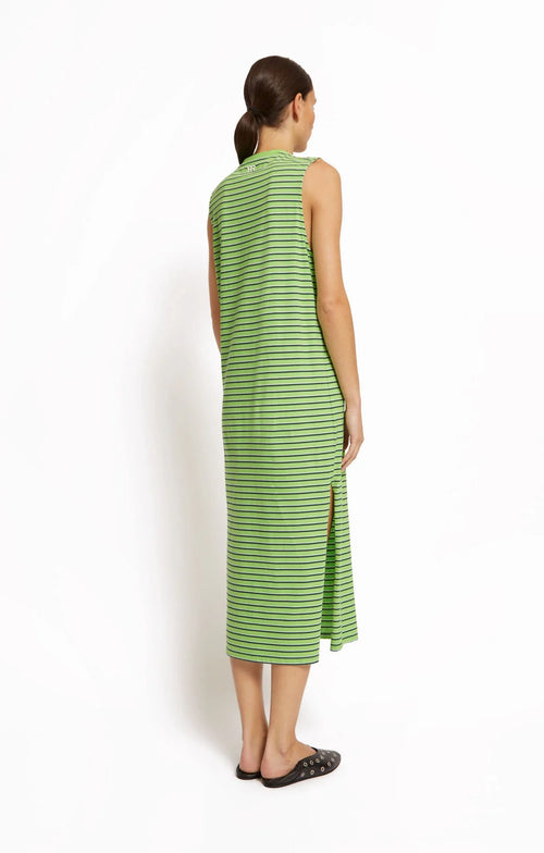 Woman wearing a green striped dress by Roseanna against a white background