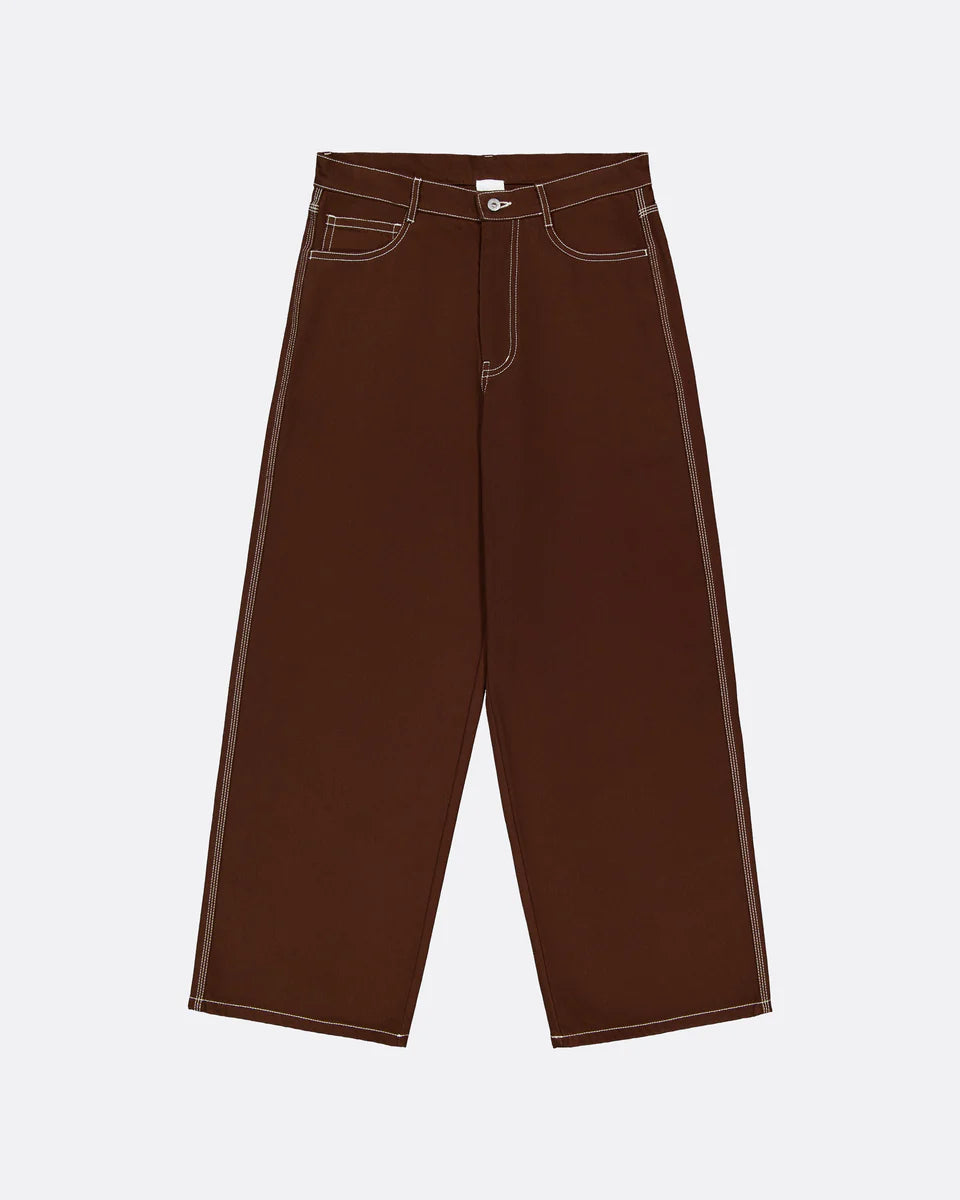 Brown craft jeans by kowtow on a white background.