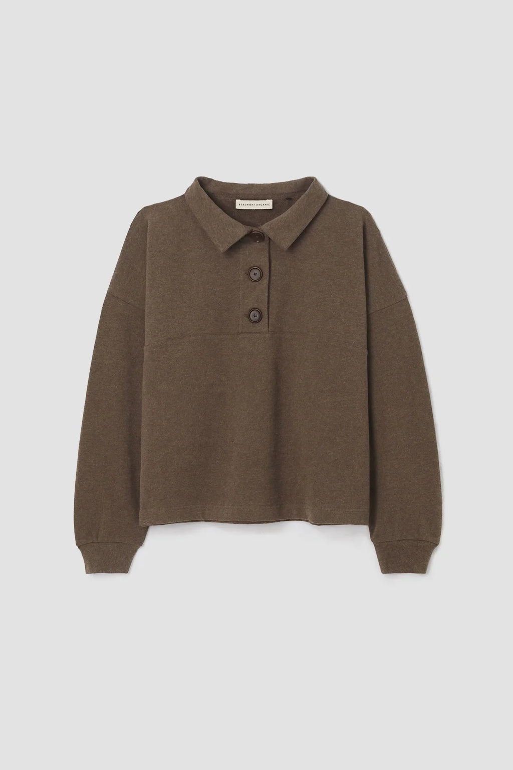 A woman wearing the Holly brown collared Sweatshirt by Beaumont Organic with matching pants.